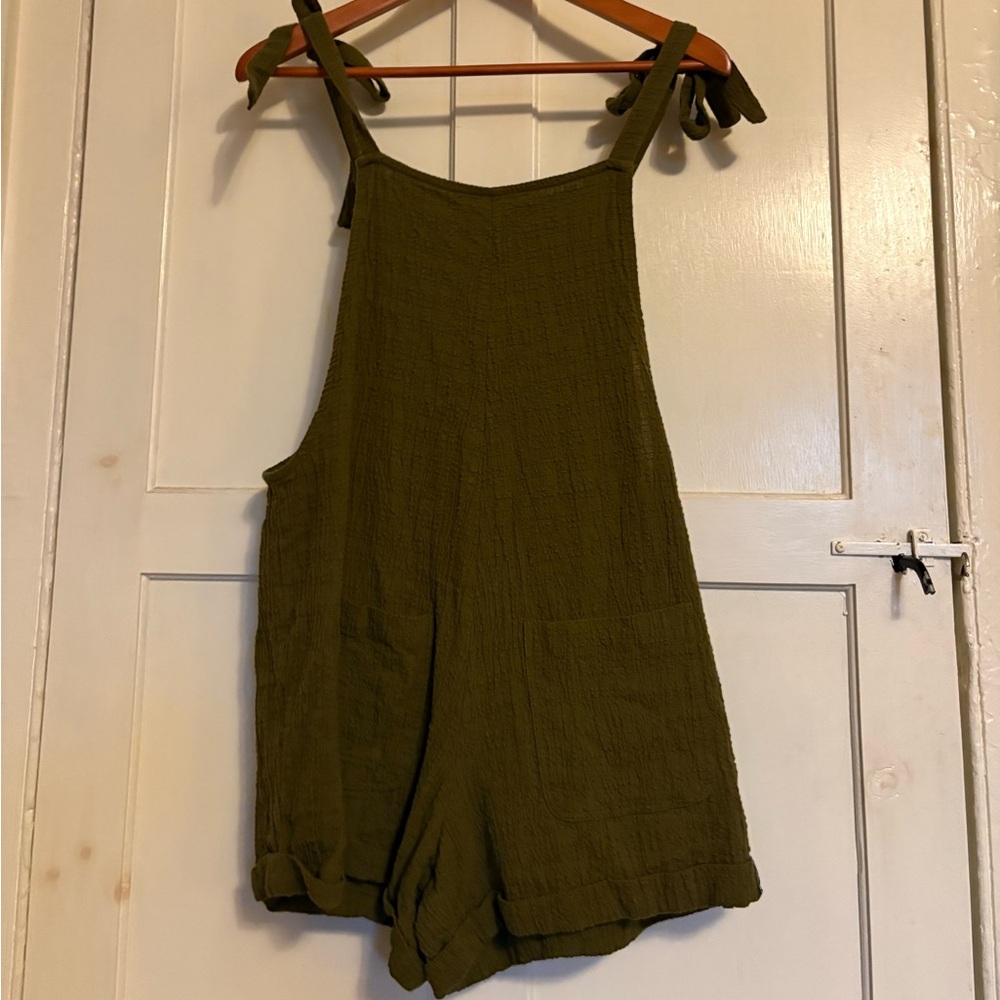 Gently worn Organic Cotton Romper, great earthy green color.